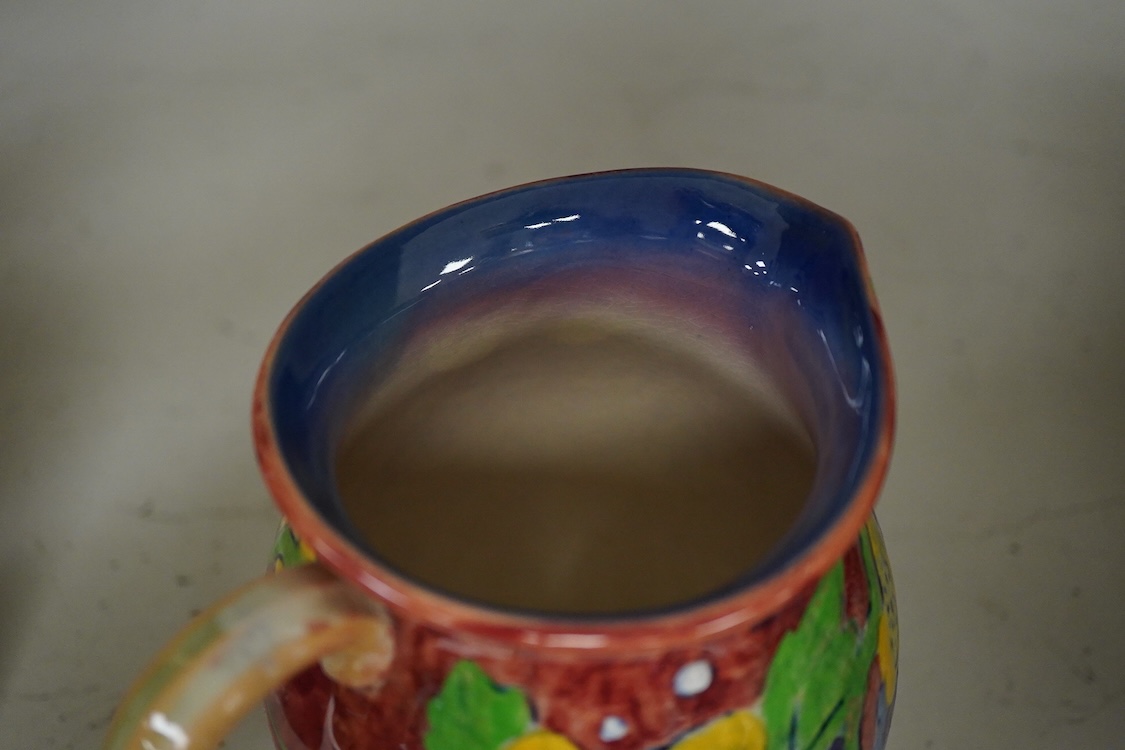 A Royal Doulton pottery jug, designed by Frank Brangwyn, numbered 8020, 15cm high